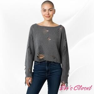 This trendy Romwe sweater is perfect for adding a touch of edgy style to your